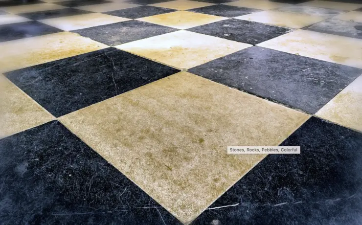 An image of a black and white tile floor.