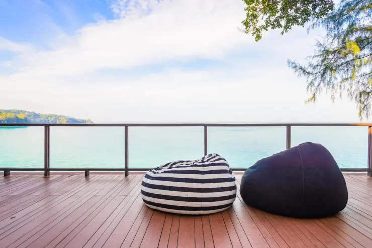 an image of large deck near an ocean with a deck waterproofing membrane